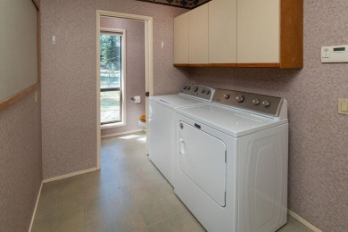 Welcome this beautiful single-story home nestled on the 7th on Sunriver Woodlands Golf Course in Oregon - for sale on GolfHomes.com, golf home, golf lot