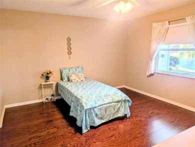 Fabulous,  beautifully maintained Twintree  with gorgeous lake on Caloosa Greens Executive Golf Course in Florida - for sale on GolfHomes.com, golf home, golf lot