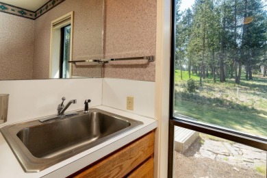 Welcome this beautiful single-story home nestled on the 7th on Sunriver Woodlands Golf Course in Oregon - for sale on GolfHomes.com, golf home, golf lot