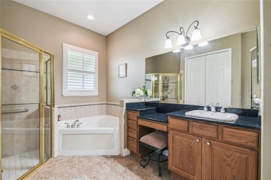 Welcome to this spacious and well-appointed Sevilla model on Swiss Fairways in Florida - for sale on GolfHomes.com, golf home, golf lot