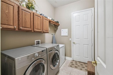 Welcome to this spacious and well-appointed Sevilla model on Swiss Fairways in Florida - for sale on GolfHomes.com, golf home, golf lot