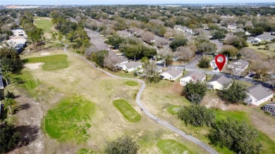 REDUCED $10,000.  Immaculate home located on the 14th Tee of the on Kings Ridge Golf Club in Florida - for sale on GolfHomes.com, golf home, golf lot