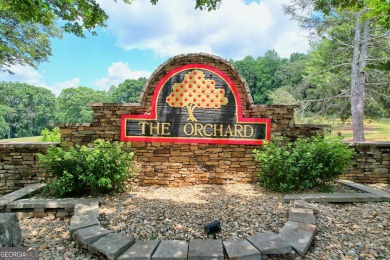 Nestled in the picturesque North Georgia Mountains, this 1-acre on The Orchard Golf and Country Club in Georgia - for sale on GolfHomes.com, golf home, golf lot