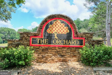 Nestled in the picturesque North Georgia Mountains, this 1-acre on The Orchard Golf and Country Club in Georgia - for sale on GolfHomes.com, golf home, golf lot