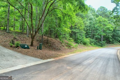 Nestled in the picturesque North Georgia Mountains, this 1-acre on The Orchard Golf and Country Club in Georgia - for sale on GolfHomes.com, golf home, golf lot