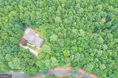 Nestled in the picturesque North Georgia Mountains, this 1-acre on The Orchard Golf and Country Club in Georgia - for sale on GolfHomes.com, golf home, golf lot