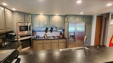 Lovely townhome in Kalispell fronting on the fairway at Buffalo on Buffalo Hill Golf Club in Montana - for sale on GolfHomes.com, golf home, golf lot