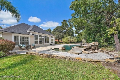 Welcome to this stunning pool home with CONCRETE BLOCK on The Deerwood Country Club in Florida - for sale on GolfHomes.com, golf home, golf lot