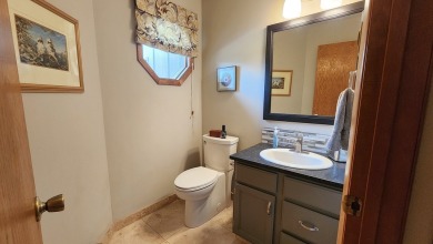 Lovely townhome in Kalispell fronting on the fairway at Buffalo on Buffalo Hill Golf Club in Montana - for sale on GolfHomes.com, golf home, golf lot