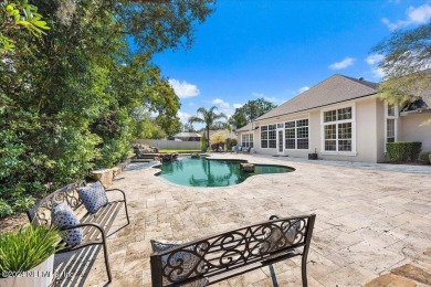 Welcome to this stunning pool home with CONCRETE BLOCK on The Deerwood Country Club in Florida - for sale on GolfHomes.com, golf home, golf lot