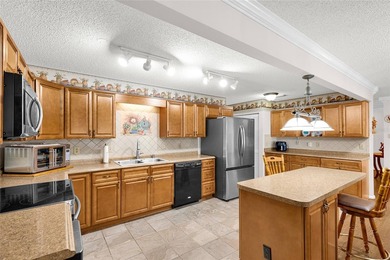 This beautiful villa is in the On Top of the World, a Premiere on On Top of the World Golf Course in Florida - for sale on GolfHomes.com, golf home, golf lot