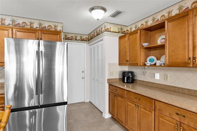 This beautiful villa is in the On Top of the World, a Premiere on On Top of the World Golf Course in Florida - for sale on GolfHomes.com, golf home, golf lot