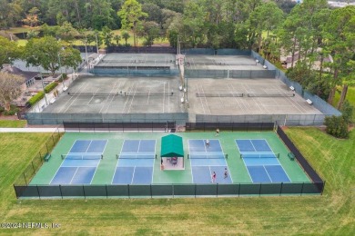 Welcome to this stunning pool home with CONCRETE BLOCK on The Deerwood Country Club in Florida - for sale on GolfHomes.com, golf home, golf lot