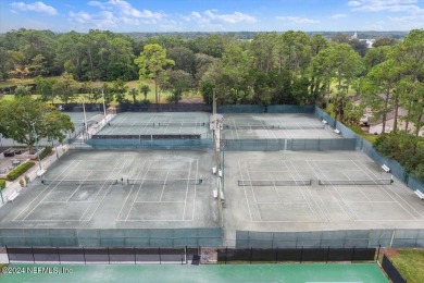 Welcome to this stunning pool home with CONCRETE BLOCK on The Deerwood Country Club in Florida - for sale on GolfHomes.com, golf home, golf lot