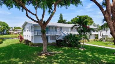 Welcome to this bright and spacious 2-bedroom, 2-bathroom on Hillsboro Pines Golf in Florida - for sale on GolfHomes.com, golf home, golf lot