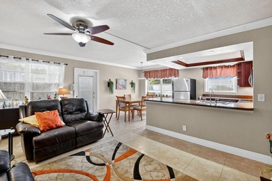 Welcome to this bright and spacious 2-bedroom, 2-bathroom on Hillsboro Pines Golf in Florida - for sale on GolfHomes.com, golf home, golf lot