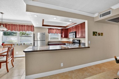Welcome to this bright and spacious 2-bedroom, 2-bathroom on Hillsboro Pines Golf in Florida - for sale on GolfHomes.com, golf home, golf lot
