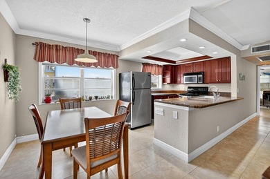 Welcome to this bright and spacious 2-bedroom, 2-bathroom on Hillsboro Pines Golf in Florida - for sale on GolfHomes.com, golf home, golf lot