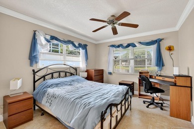 Welcome to this bright and spacious 2-bedroom, 2-bathroom on Hillsboro Pines Golf in Florida - for sale on GolfHomes.com, golf home, golf lot