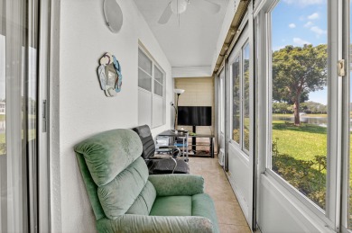 Welcome to this bright and spacious 2-bedroom, 2-bathroom on Hillsboro Pines Golf in Florida - for sale on GolfHomes.com, golf home, golf lot