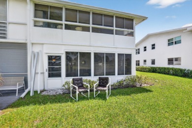 Welcome to this bright and spacious 2-bedroom, 2-bathroom on Hillsboro Pines Golf in Florida - for sale on GolfHomes.com, golf home, golf lot