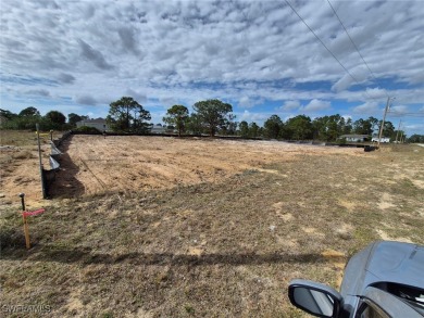 This prime lot at 360 Paisley Avenue in Lehigh Acres is the on Mirror Lakes Golf Club in Florida - for sale on GolfHomes.com, golf home, golf lot