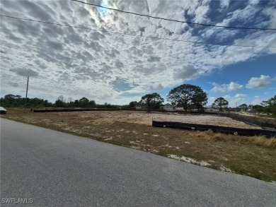 This prime lot at 360 Paisley Avenue in Lehigh Acres is the on Mirror Lakes Golf Club in Florida - for sale on GolfHomes.com, golf home, golf lot