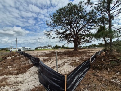 This prime lot at 360 Paisley Avenue in Lehigh Acres is the on Mirror Lakes Golf Club in Florida - for sale on GolfHomes.com, golf home, golf lot