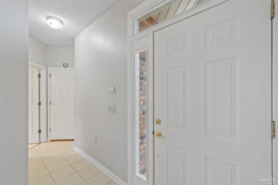 Located at 1456 Champions Green Drive in Gulf Breeze, Florida on Tiger Point Golf and Country Club in Florida - for sale on GolfHomes.com, golf home, golf lot