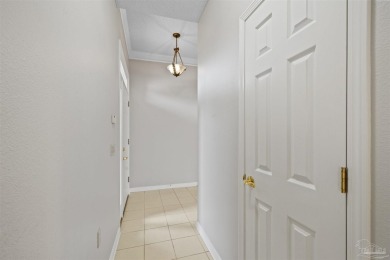 Located at 1456 Champions Green Drive in Gulf Breeze, Florida on Tiger Point Golf and Country Club in Florida - for sale on GolfHomes.com, golf home, golf lot