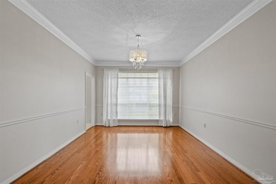 Located at 1456 Champions Green Drive in Gulf Breeze, Florida on Tiger Point Golf and Country Club in Florida - for sale on GolfHomes.com, golf home, golf lot