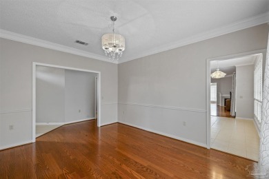 Located at 1456 Champions Green Drive in Gulf Breeze, Florida on Tiger Point Golf and Country Club in Florida - for sale on GolfHomes.com, golf home, golf lot