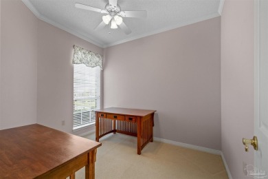 Located at 1456 Champions Green Drive in Gulf Breeze, Florida on Tiger Point Golf and Country Club in Florida - for sale on GolfHomes.com, golf home, golf lot