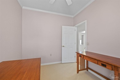 Located at 1456 Champions Green Drive in Gulf Breeze, Florida on Tiger Point Golf and Country Club in Florida - for sale on GolfHomes.com, golf home, golf lot