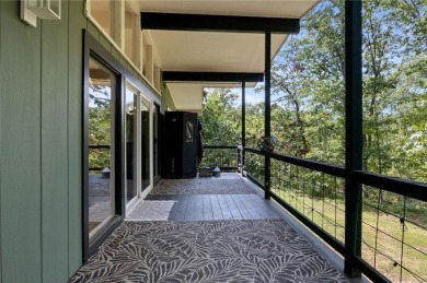 Beautiful remodeled home that backs up to the Tunnel Vision Bike on Bella Vista Country Club and Golf Course in Arkansas - for sale on GolfHomes.com, golf home, golf lot