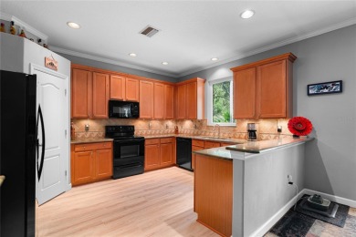 Discover the perfect blend of style, comfort, and privacy in the on Heritage Harbor Golf and Country Club in Florida - for sale on GolfHomes.com, golf home, golf lot