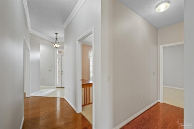 Located at 1456 Champions Green Drive in Gulf Breeze, Florida on Tiger Point Golf and Country Club in Florida - for sale on GolfHomes.com, golf home, golf lot