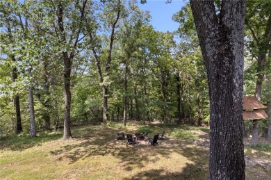 Beautiful remodeled home that backs up to the Tunnel Vision Bike on Bella Vista Country Club and Golf Course in Arkansas - for sale on GolfHomes.com, golf home, golf lot