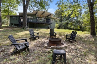 Beautiful remodeled home that backs up to the Tunnel Vision Bike on Bella Vista Country Club and Golf Course in Arkansas - for sale on GolfHomes.com, golf home, golf lot