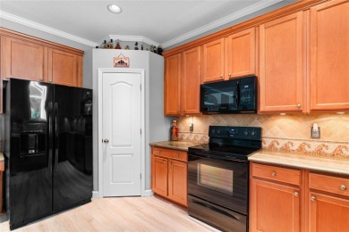 Discover the perfect blend of style, comfort, and privacy in the on Heritage Harbor Golf and Country Club in Florida - for sale on GolfHomes.com, golf home, golf lot