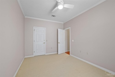 Located at 1456 Champions Green Drive in Gulf Breeze, Florida on Tiger Point Golf and Country Club in Florida - for sale on GolfHomes.com, golf home, golf lot