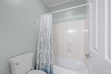 Located at 1456 Champions Green Drive in Gulf Breeze, Florida on Tiger Point Golf and Country Club in Florida - for sale on GolfHomes.com, golf home, golf lot