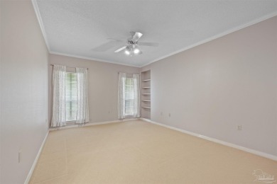 Located at 1456 Champions Green Drive in Gulf Breeze, Florida on Tiger Point Golf and Country Club in Florida - for sale on GolfHomes.com, golf home, golf lot