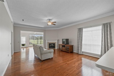 Located at 1456 Champions Green Drive in Gulf Breeze, Florida on Tiger Point Golf and Country Club in Florida - for sale on GolfHomes.com, golf home, golf lot