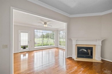 Located at 1456 Champions Green Drive in Gulf Breeze, Florida on Tiger Point Golf and Country Club in Florida - for sale on GolfHomes.com, golf home, golf lot
