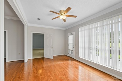 Located at 1456 Champions Green Drive in Gulf Breeze, Florida on Tiger Point Golf and Country Club in Florida - for sale on GolfHomes.com, golf home, golf lot