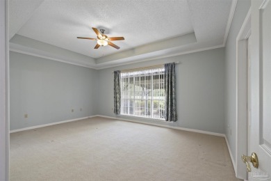 Located at 1456 Champions Green Drive in Gulf Breeze, Florida on Tiger Point Golf and Country Club in Florida - for sale on GolfHomes.com, golf home, golf lot