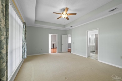 Located at 1456 Champions Green Drive in Gulf Breeze, Florida on Tiger Point Golf and Country Club in Florida - for sale on GolfHomes.com, golf home, golf lot