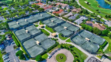 Welcome to this beautifully updated 3-bedroom, 2-bathroom condo on Boca Pointe Country Club in Florida - for sale on GolfHomes.com, golf home, golf lot