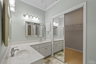 Located at 1456 Champions Green Drive in Gulf Breeze, Florida on Tiger Point Golf and Country Club in Florida - for sale on GolfHomes.com, golf home, golf lot